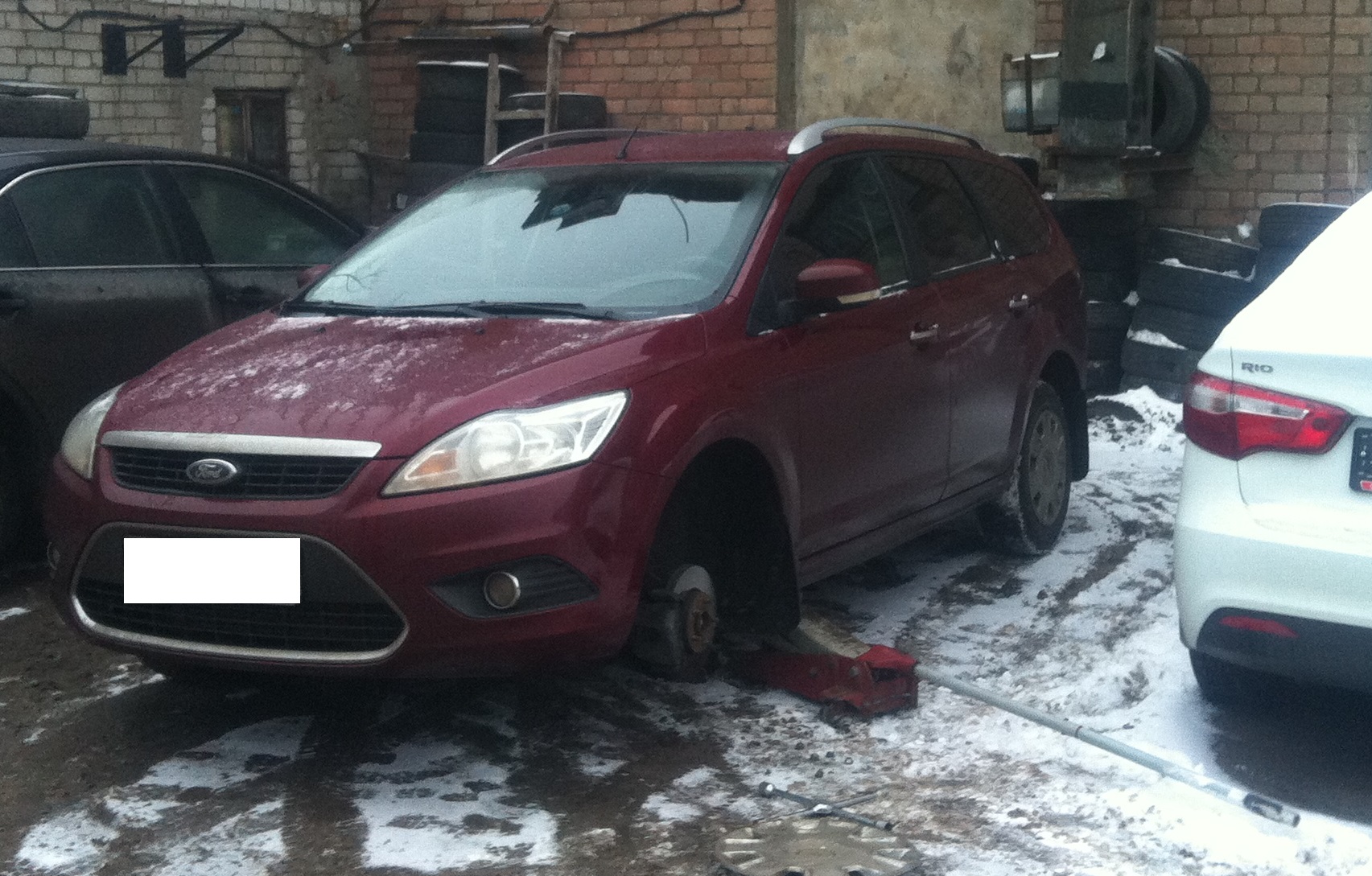 Car on trolley jack.JPG — illustrating Trolley Jack and Axle Stands: What Are They Actually For?