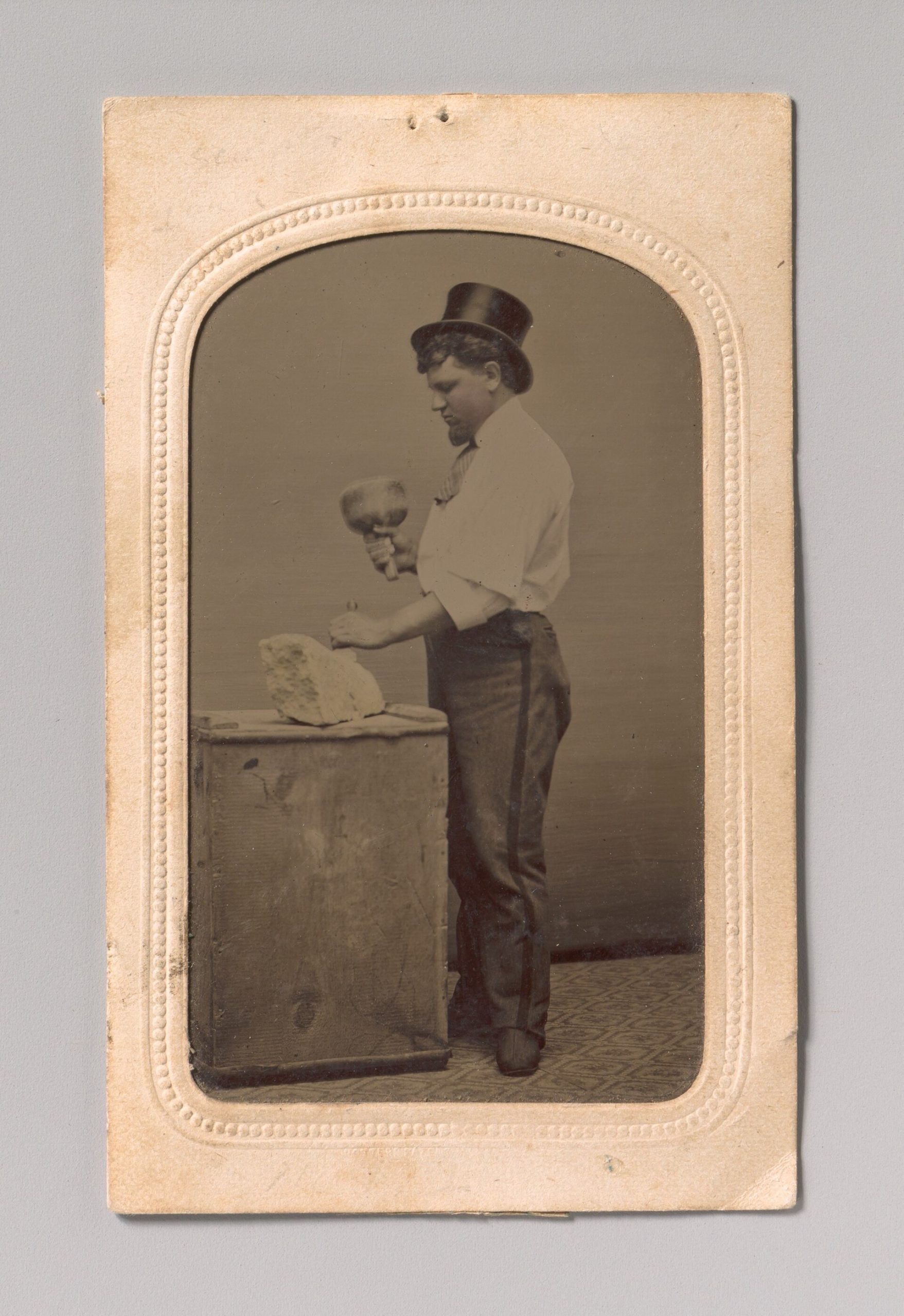 -Mason in Top Hat with Mallet, Chisel, and Piece of Stone- MET DP700340.jpg — illustrating What Is a Mallet For If You Already Own a Hammer?
