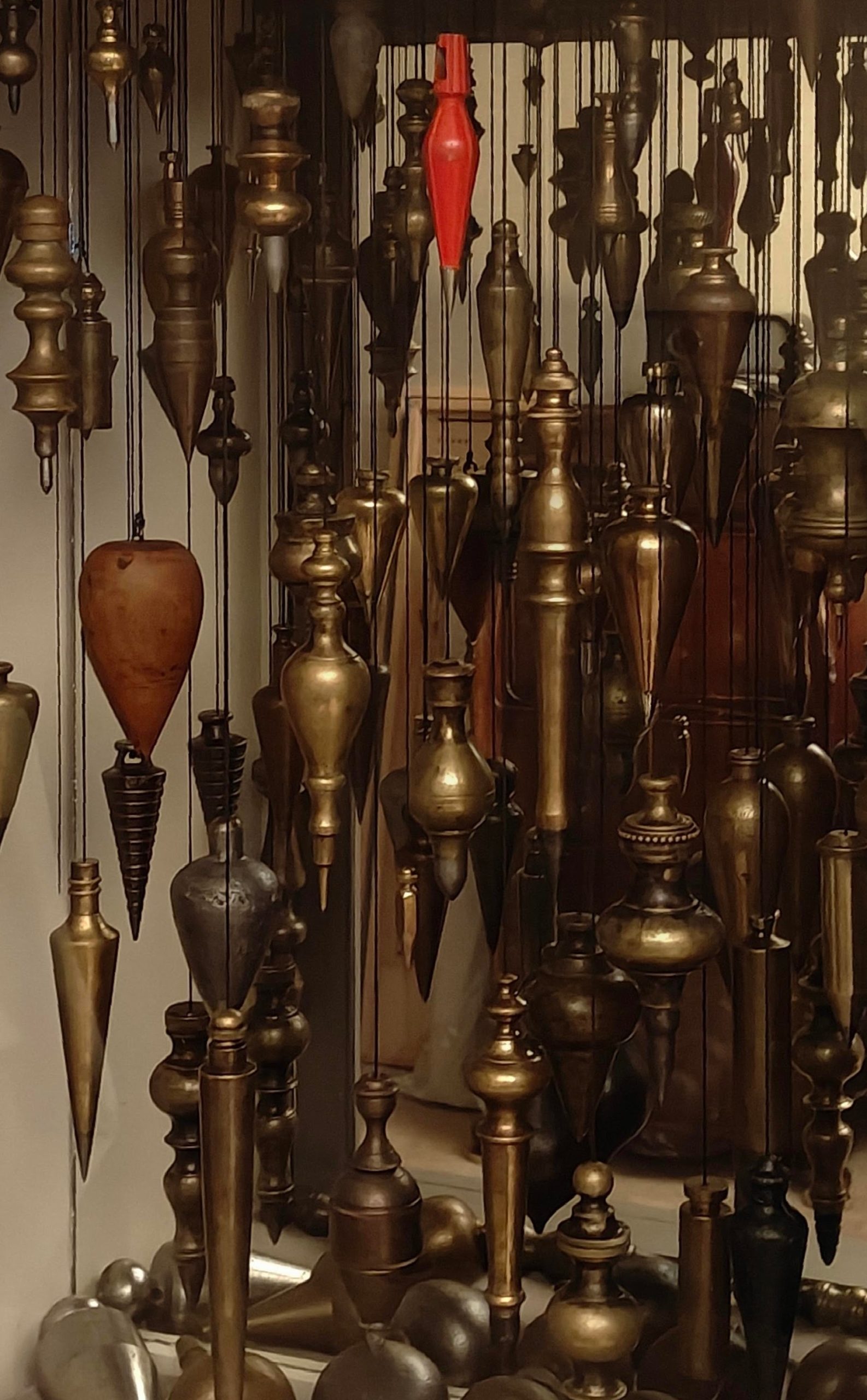 Many Plumb Bobs.jpg — illustrating What Is a Plumb Bob and Does Anyone Still Use One?