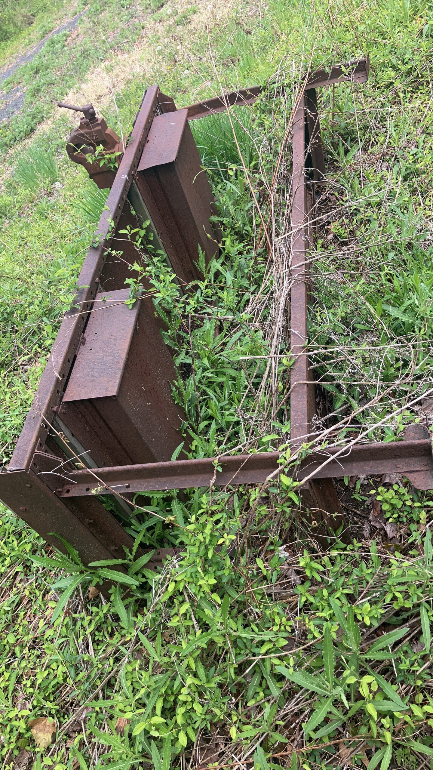 Abandoned workbench in field.jpg — illustrating Portable Workbench: What It's Good For and Its Limits