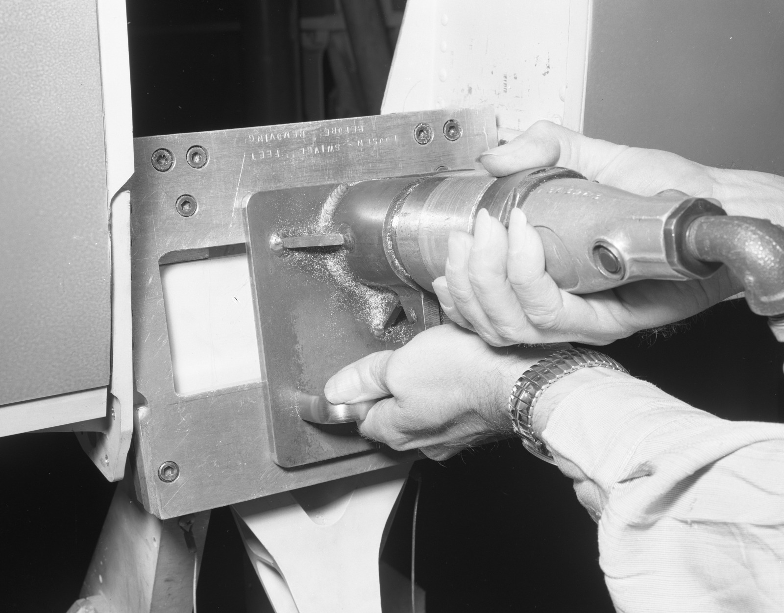 23 0068061 Convair Negative Image - Router tool in operative position 01-22-1962 (54183524710).jpg — illustrating Plunge Router vs Fixed-Base: What Can Plunge Actually Do?